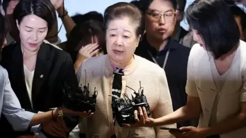 Disputed Church Head Rejects Bribery Accusations Involving Ex-South Korea President's Wife